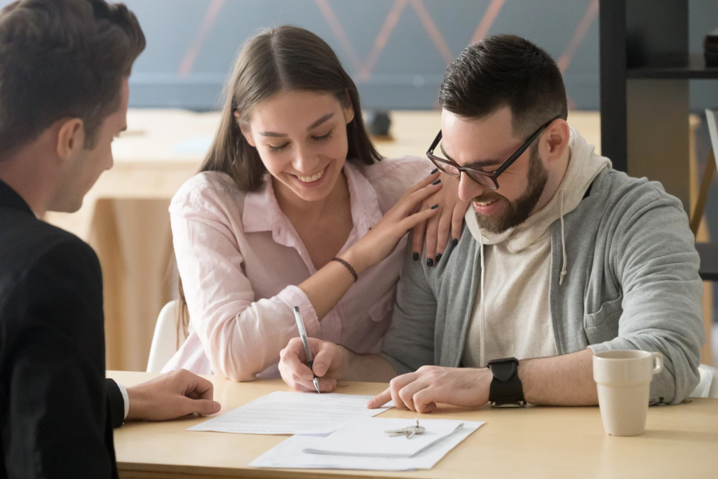 Home buyer reviewing closing documents for a Las Vegas home purchase