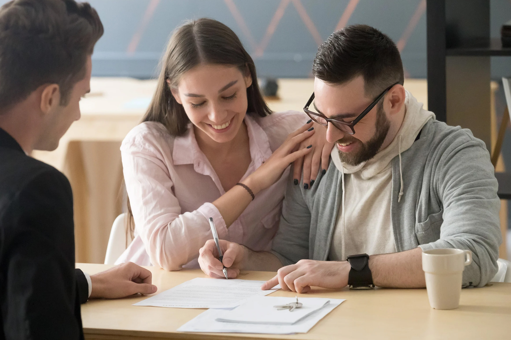 Home buyer reviewing closing documents for a Las Vegas home purchase