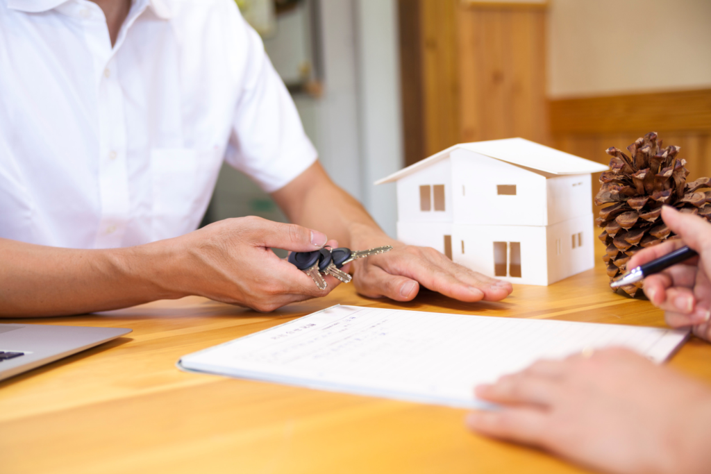 Home buyer reviewing escrow and closing documents during a real estate transaction