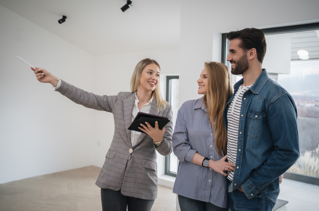 Las Vegas real estate agent showing a home to buyers