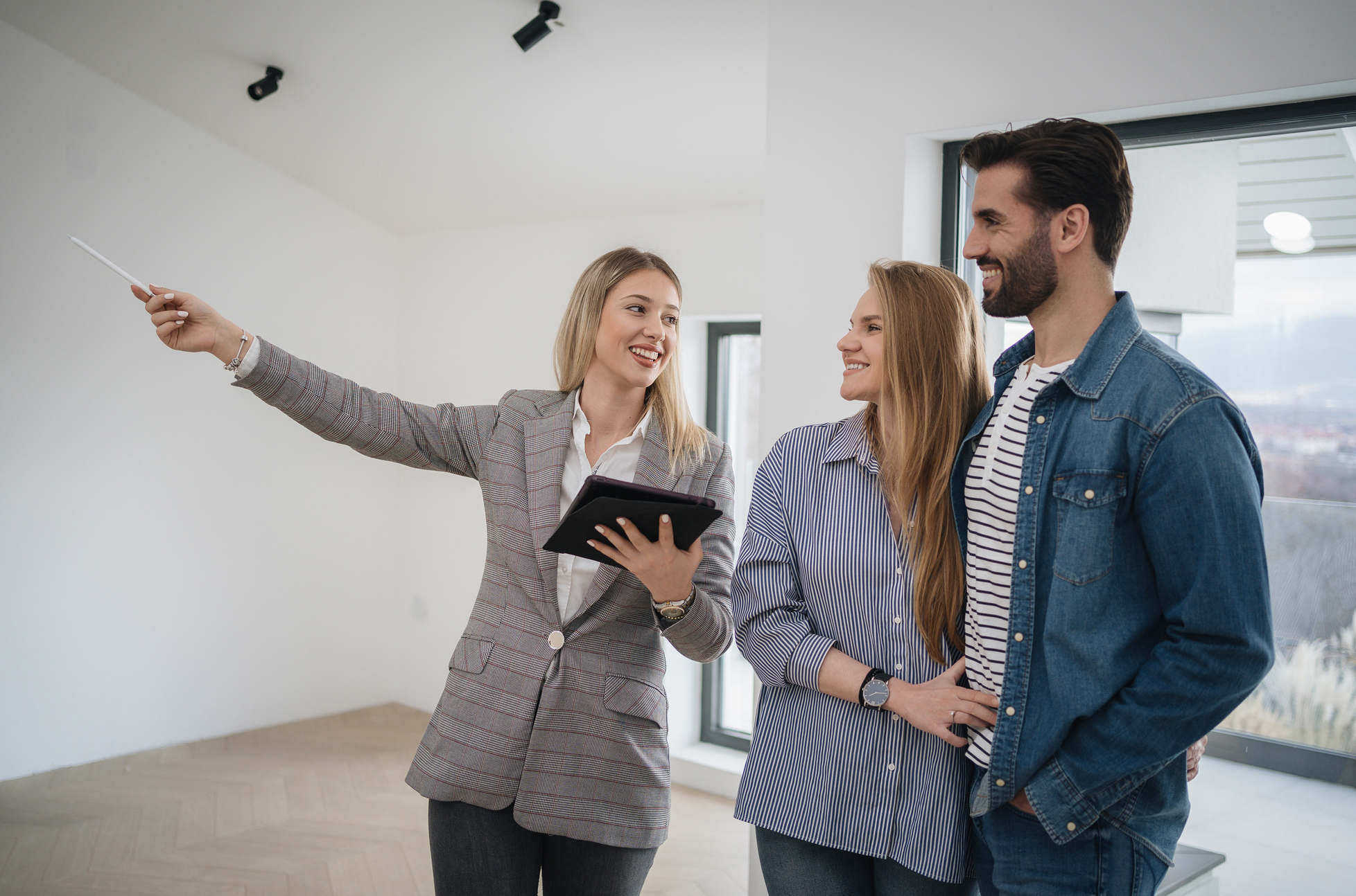 Las Vegas real estate agent showing a home to buyers